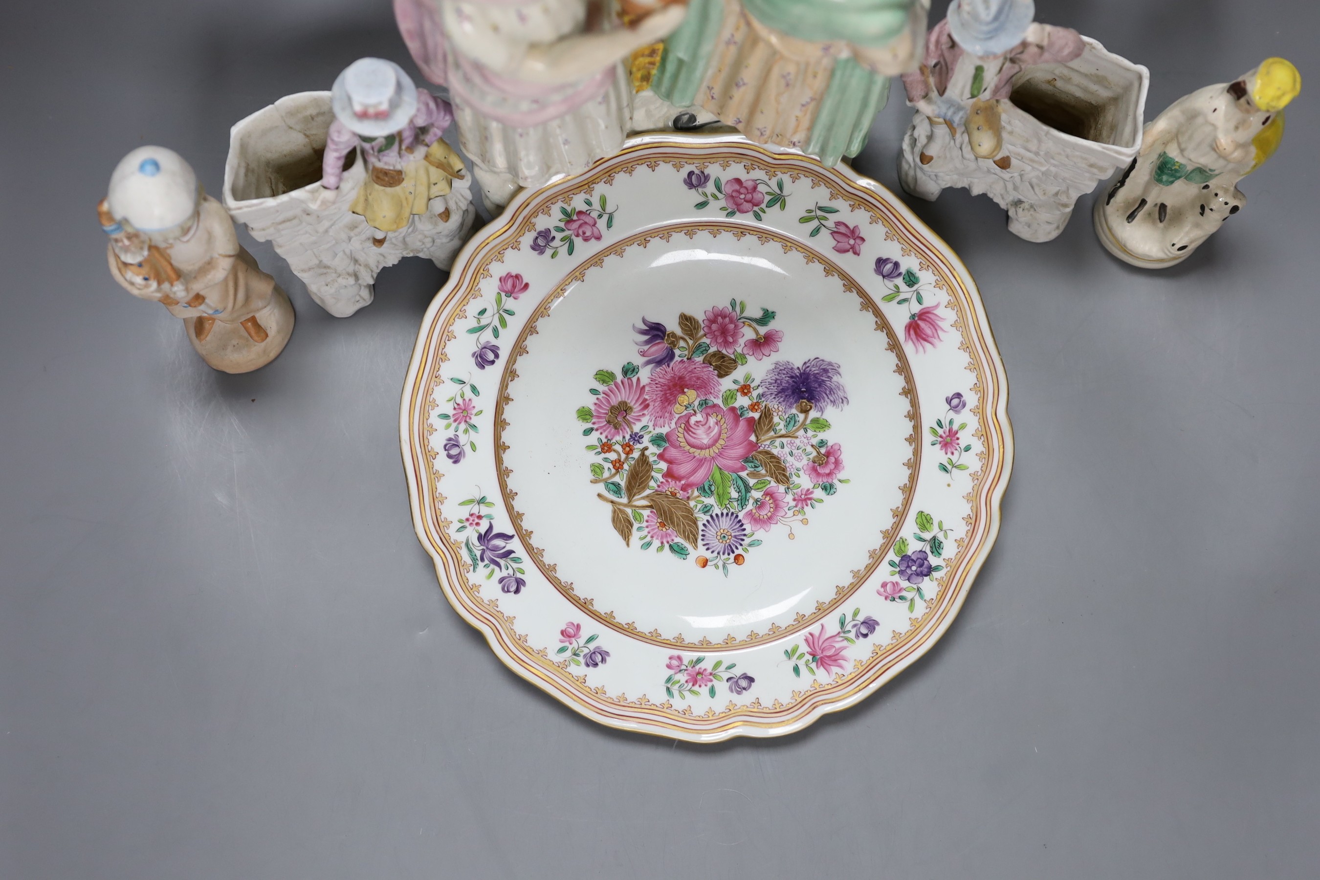 A Staffordshire flatback, Samson floral decorated dish and four other figures